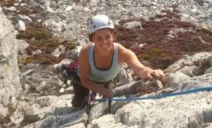 Picture of woman rock climbing at Holyhead Mountain